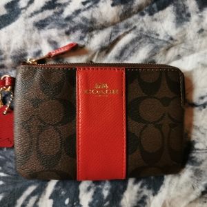COACH Wristlet. Red and Brown. New never used